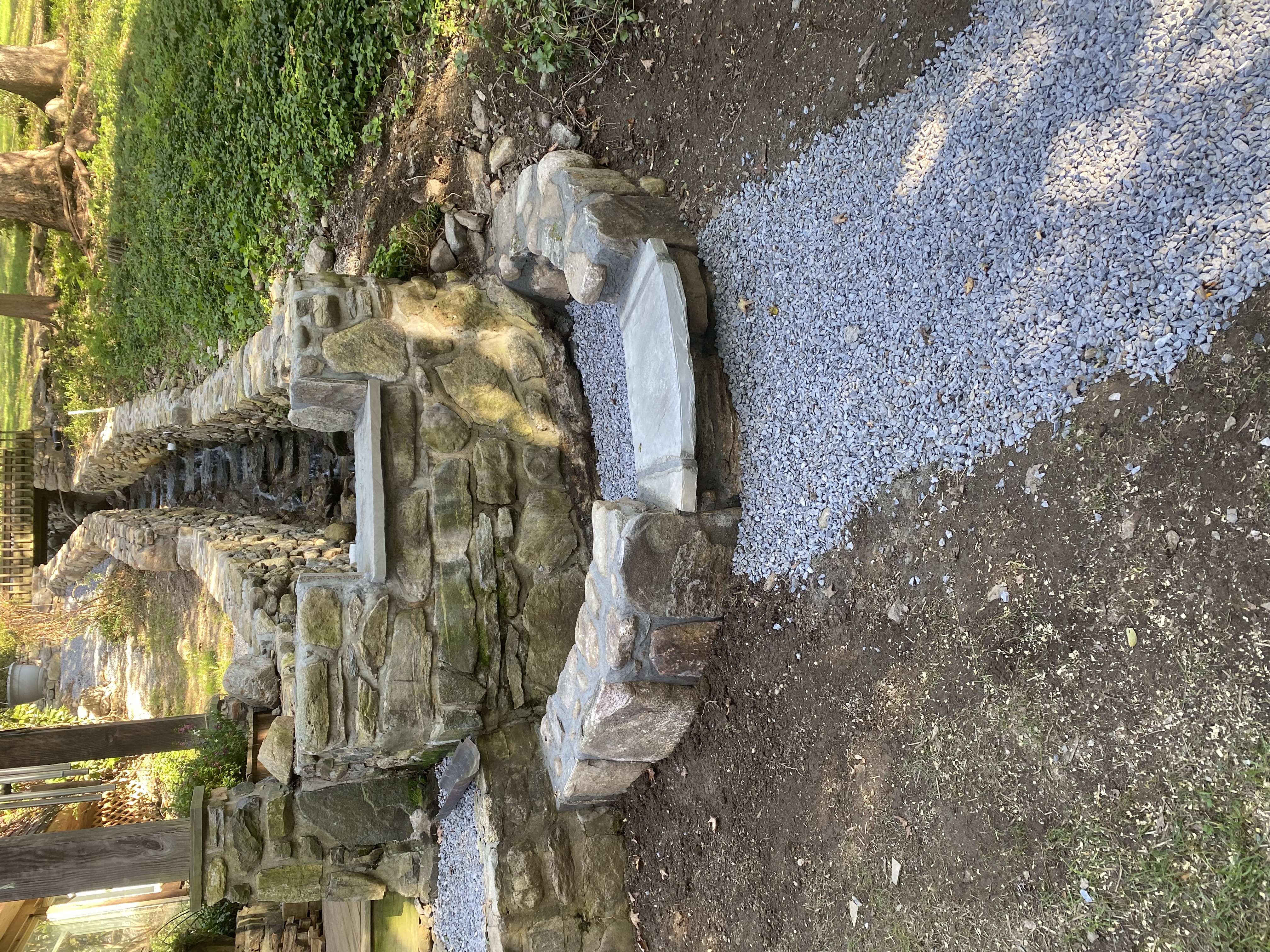 Custom stone wall installation by V.E.W Contracting