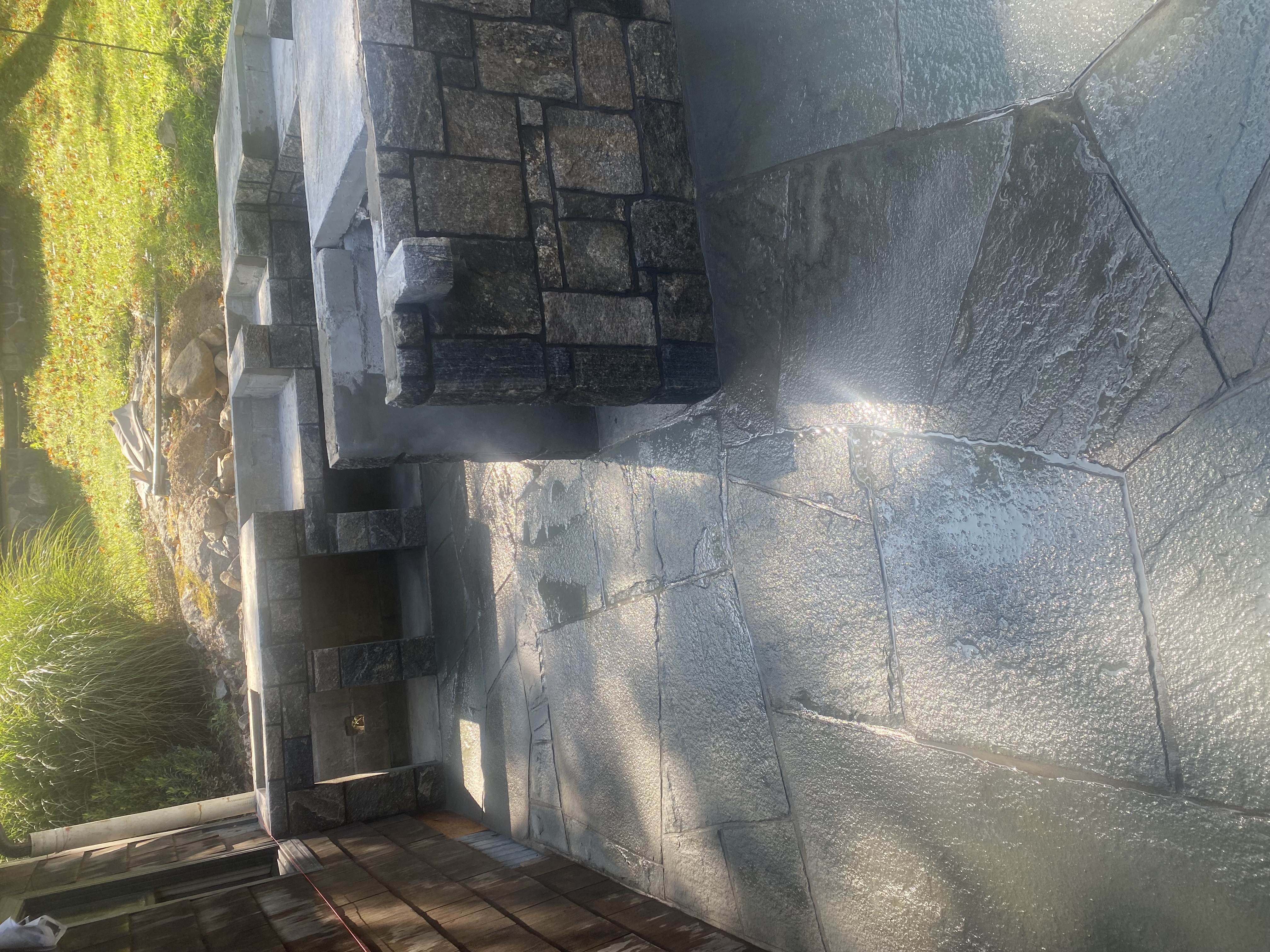 Custom stone BBQ area by V.E.W Contracting